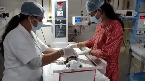 Newborn Placed Living in India Struggles for Her Life