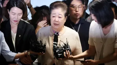 Disputed Religious Head Rejects Gift-giving Allegations Against Former South Korean President's Wife